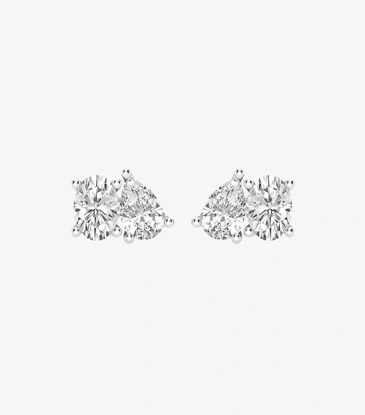 Toi-Et-Moi Earrings With Oval and Pear-Shaped Diamonds In A 3-Prong Setting