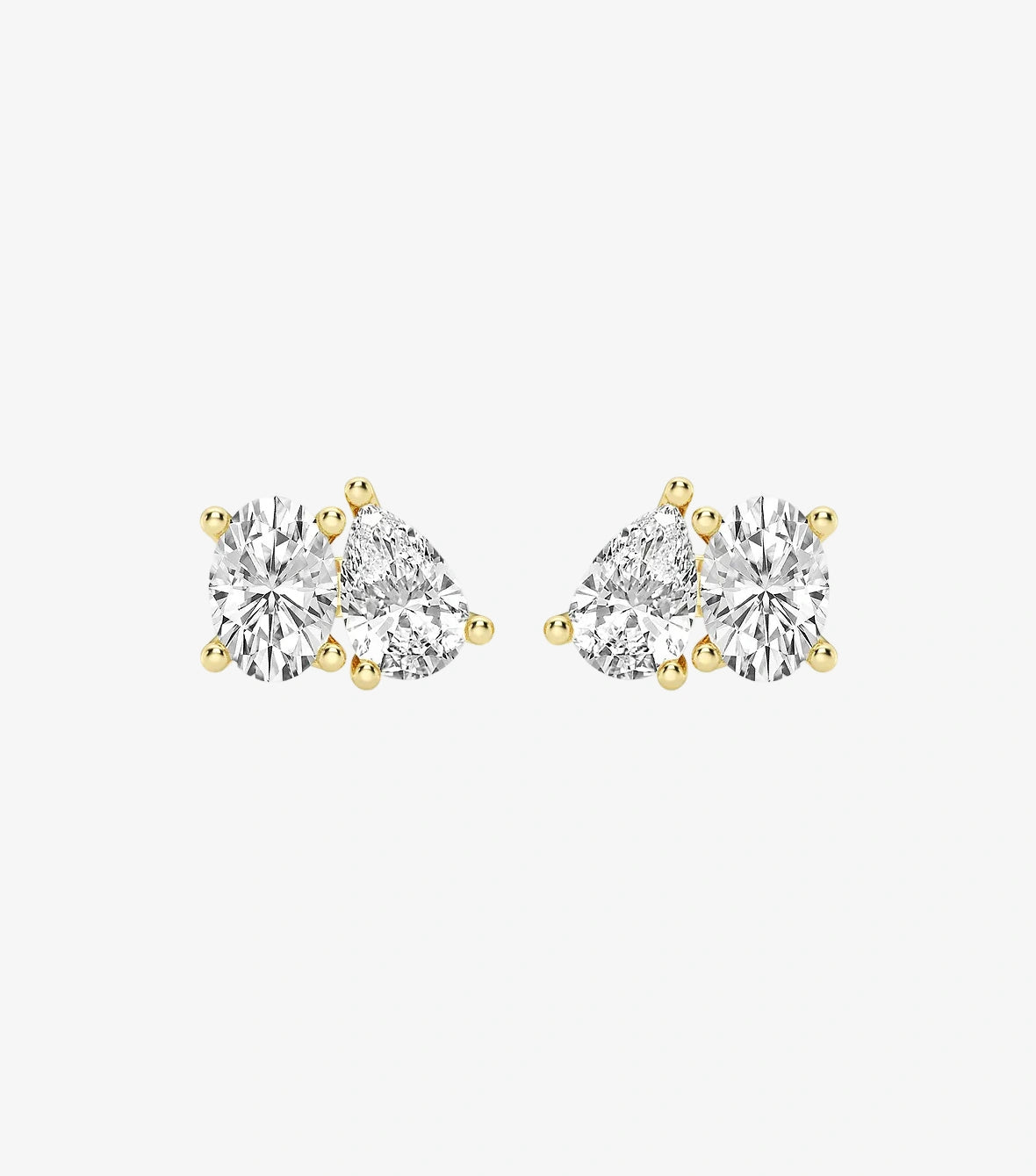 Toi-Et-Moi Earrings With Oval and Pear-Shaped Diamonds In A 3-Prong Setting